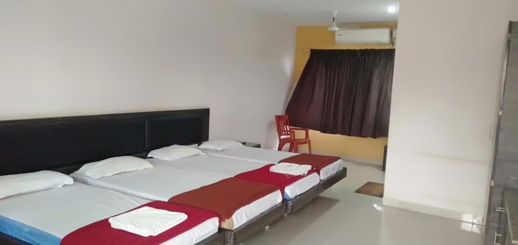 Iroomz Hoysala Residency Беллари Экстерьер фото